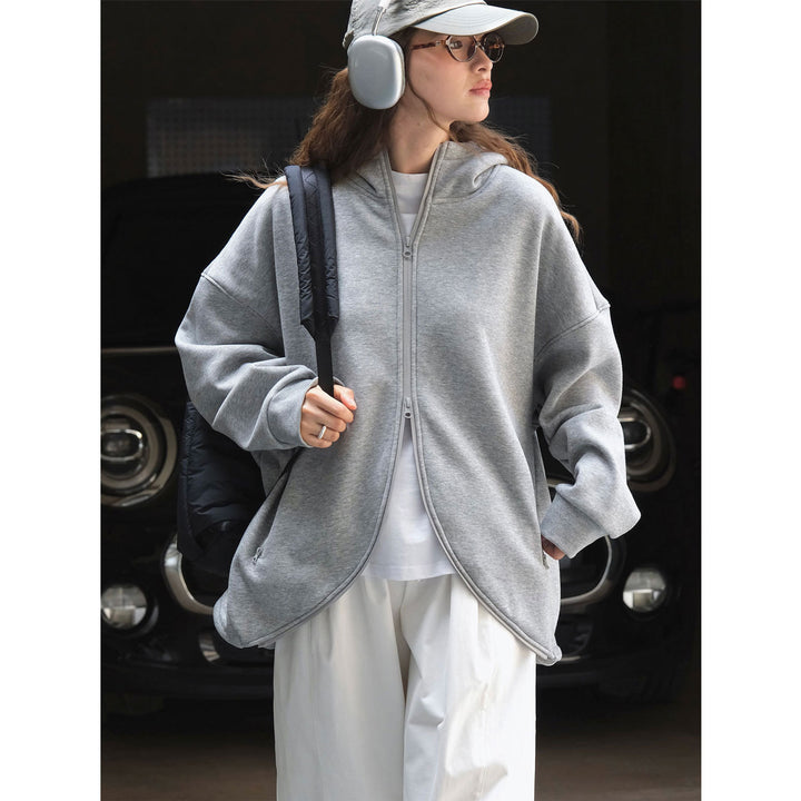 Damen Oversized Kapuzen-Sweatjacke mit geschwungenem Saum Echoarchiv