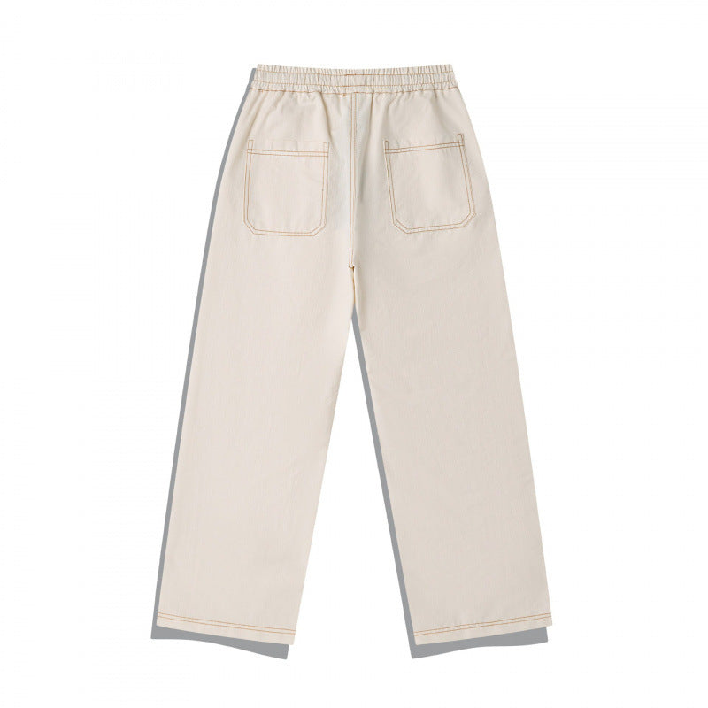 Unisex Weite Denim-Hose mit elastischem Bund, Kordelzug und gesteppter Kniepasse Echo Archiv