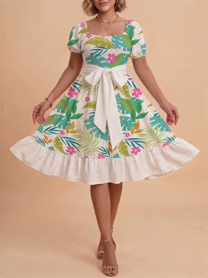 Damen Kleid mit tailliertem Schnitt und verspieltem Blumenmuster Echo Archiv