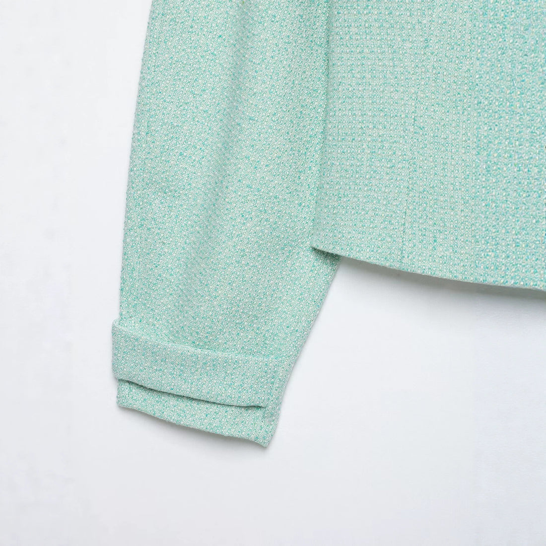 Damen Kurzblouson aus Bouclé mit verdecktem Reißverschluss und Umschlagmanschetten Echo Archiv