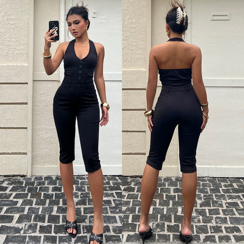 Damen figurbetonter Jumpsuit mit elegantem Halterneck und Knopfleiste Echo Archiv