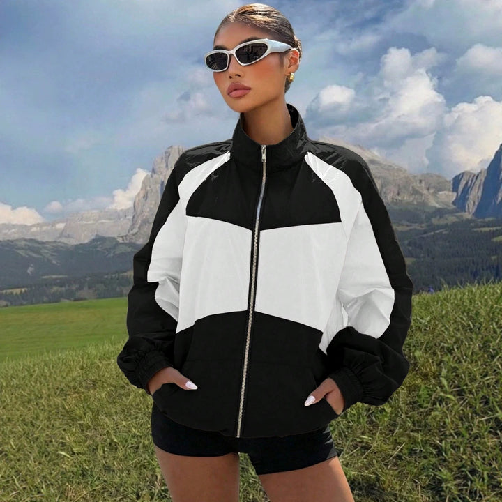 Damen Leichte Windbreaker-Jacke mit Stehkragen, Farbblock-Design und elastischen Bündchen Echo Archiv