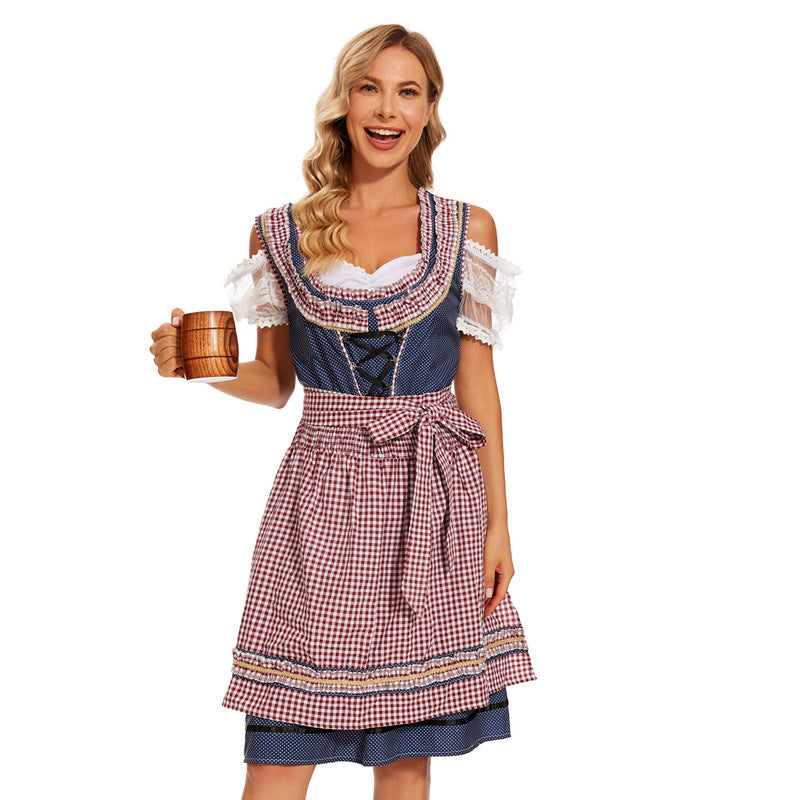 Damen nan traditionelles Dirndlkleid mit kariertem Schürzenrock, Schnürung und Spitzenärmeln Echo Archiv