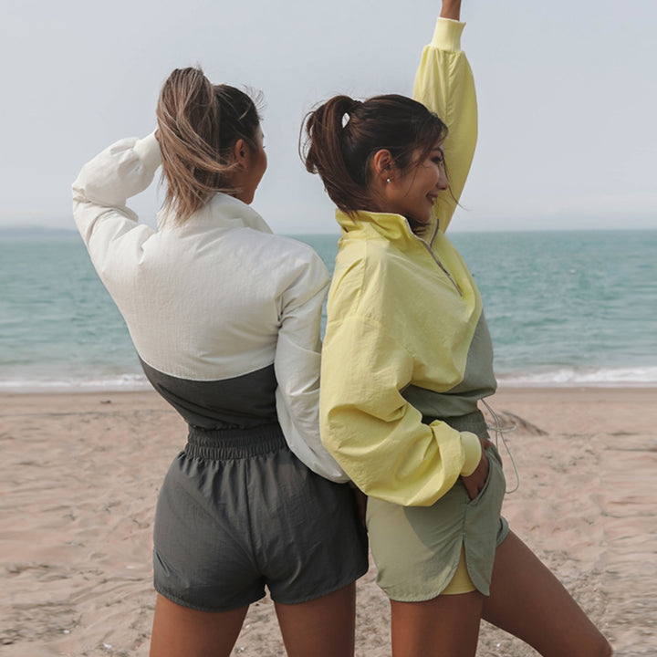 Damen nan sportliches kurzes Trainingsset mit halbem Reißverschluss, Tunnelzug und elastischen Laufshorts Echo Archiv
