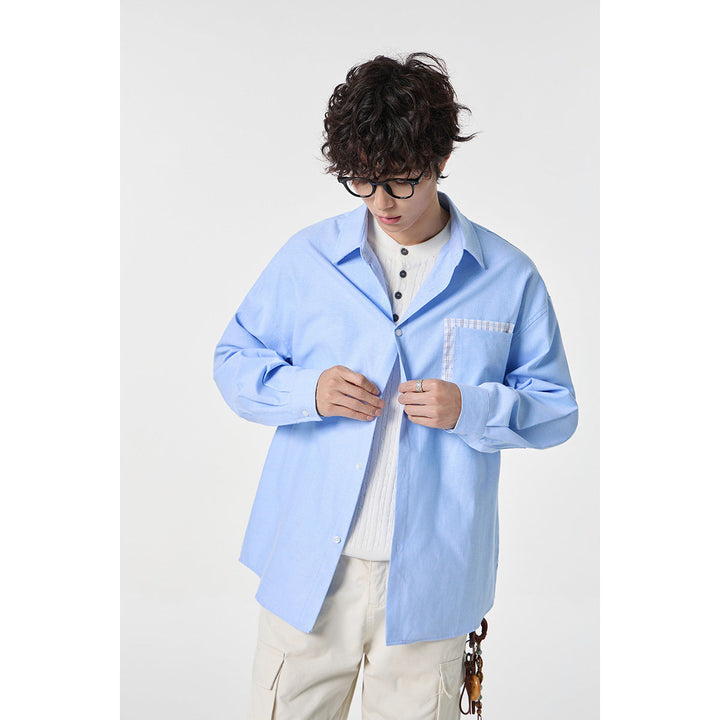 Damen Oversize Baumwoll-Hemd mit Karobesatz an Brusttasche und Saum Echoarchiv
