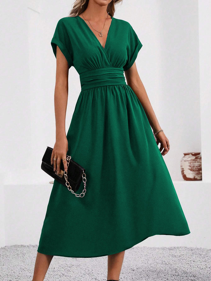 Echoarchiv | Elegante Wickelkleid