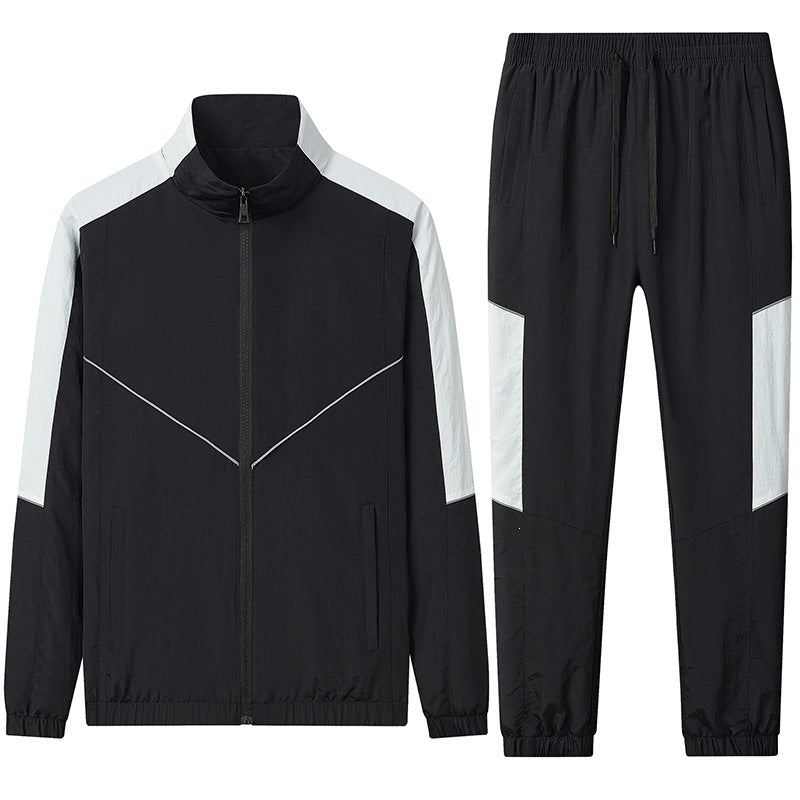 Herren Zweiteiliges atmungsaktives Nylon-Trainingsset mit Stehkragen und Kontrastpaneelen Echoarchiv