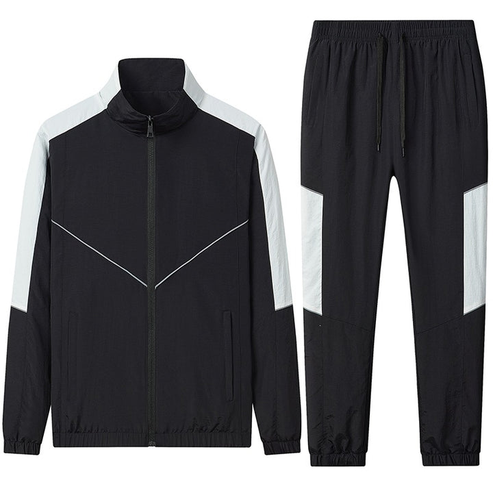 Herren Zweiteiliges atmungsaktives Nylon-Trainingsset mit Stehkragen und Kontrastpaneelen Echoarchiv