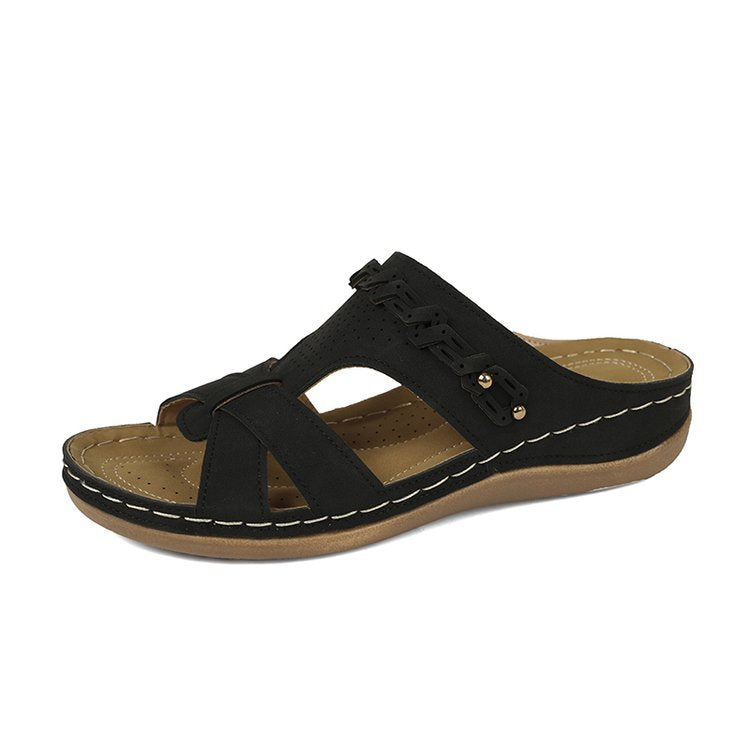 Damen Lederimitat-Pantolette mit perforiertem Oberteil, gepolstertem Komfortfußbett und leichtem Keil – Sorelia