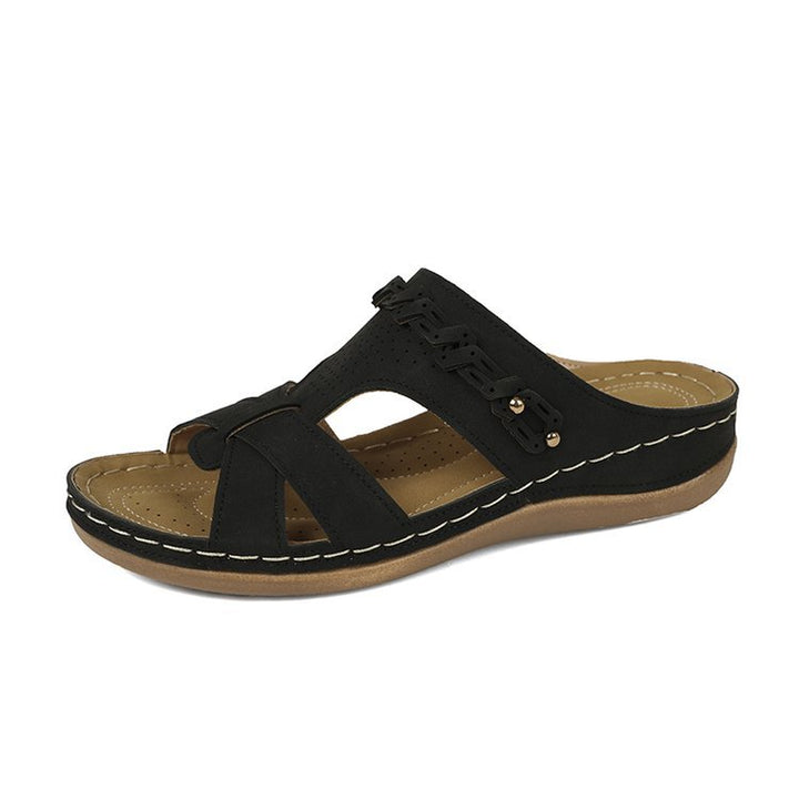 Damen Lederimitat-Pantolette mit perforiertem Oberteil, gepolstertem Komfortfußbett und leichtem Keil – Sorelia