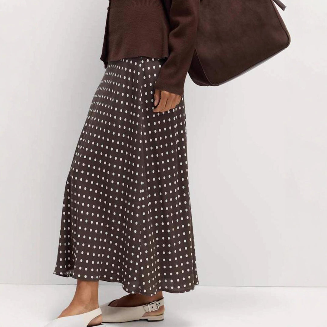 Damen Midirock mit Polka‑Dot Muster, asymmetrischem Saum und seitlichem Schlitz – Avérine