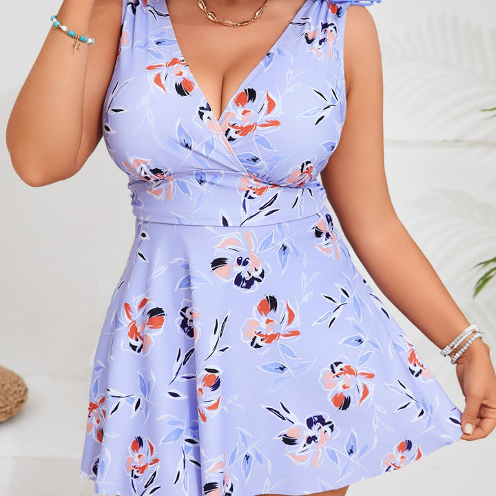 Damen Badeanzug mit floralem Schnitt und praktischen Taschen Echo Archiv