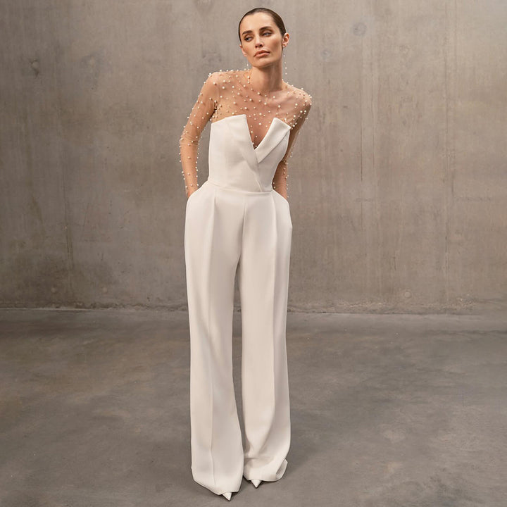 Damen eleganter Jumpsuit mit transparenten Ärmeln und Perlenverzierung Echo Archiv