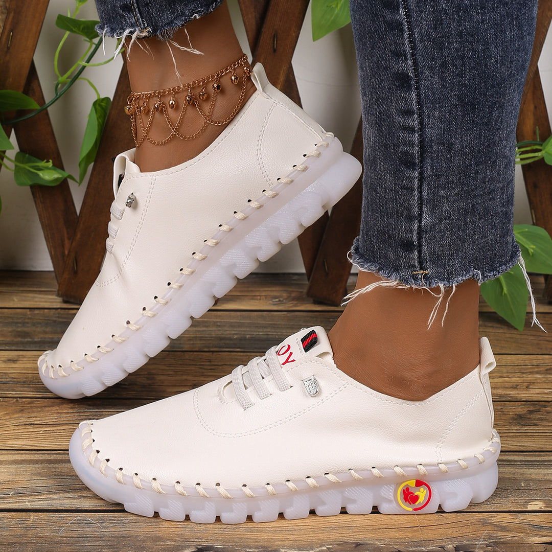Damen Bequeme Lederoptik-Slipper mit flexibler Profilsohle und Mokassin-Naht – Lioré