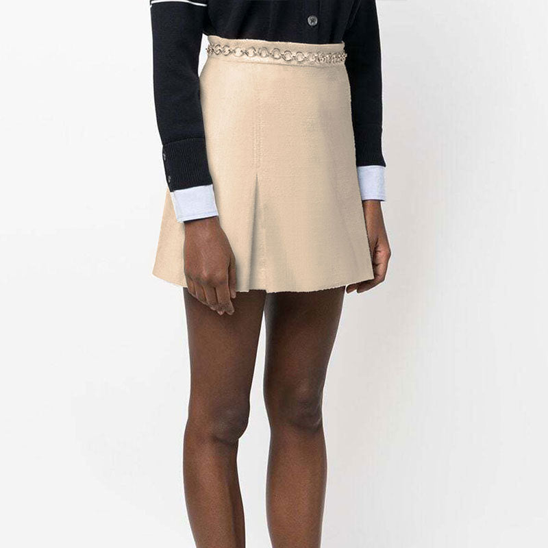 Damen eleganter Miniröcke mit goldener Kette Echo Archiv