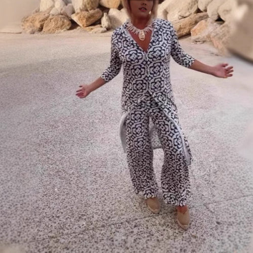 Damen Freizeit Maxi Kleid in ornamentalem Druck mit V-Ausschnitt, 3/4-Ärmeln und zentralem Frontschlitz – Valéora