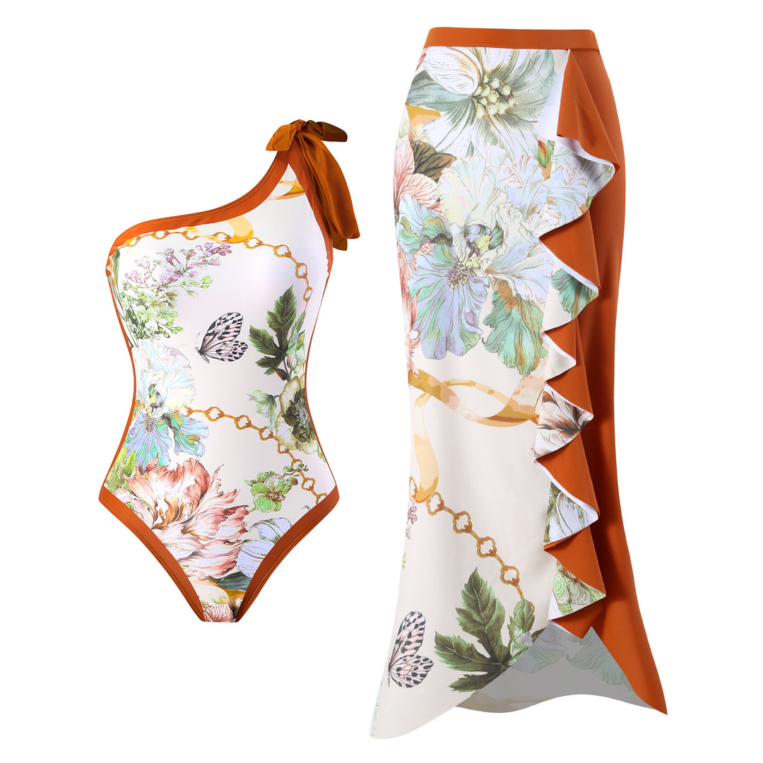 Damen Einteiler Badeanzug mit asymmetrischem Schnitt und elegantem Wickelrock Echo Archiv