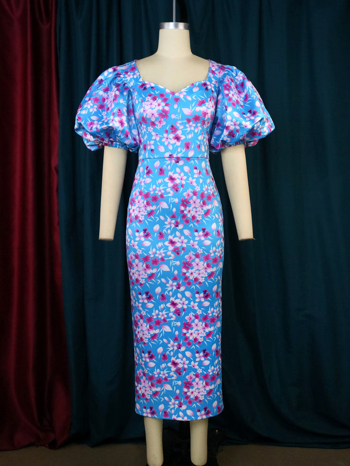 Damen Elegantes Kleid mit voluminösen Puffärmeln und floralem Muster Echo Archiv
