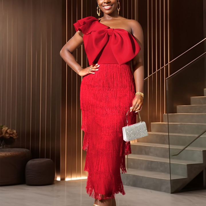 Damen elegantes Kleid mit voluminösem Rüschenelement und Fransen Echo Archiv