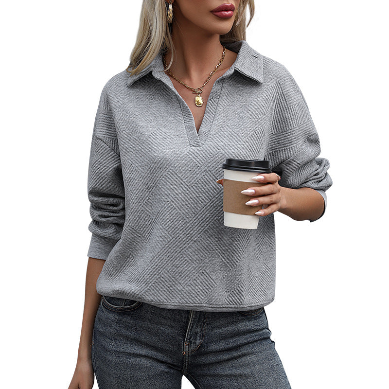Damen Strukturierter Feinstrick-Pullover mit Polokragen und tiefem V-Ausschnitt Echoarchiv