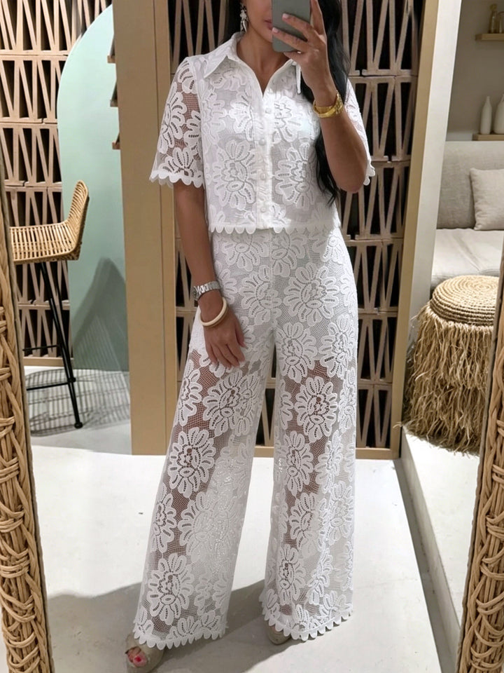 Damen nan elegante Spitzenkombination mit kurzärmeliger Hemdbluse, Muschelsaum und taillierter Palazzohose mit Bindegürtel Echo Archiv