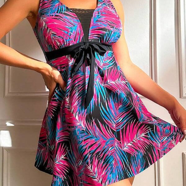 Damen Strandkleid mit floralem Muster und eleganter Raffung Echo Archiv