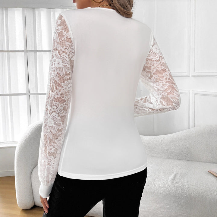 Damen nan figurbetontes Spitzenshirt mit V-Ausschnitt, transparenten Spitzenärmeln und Strassbesatz Echo Archiv