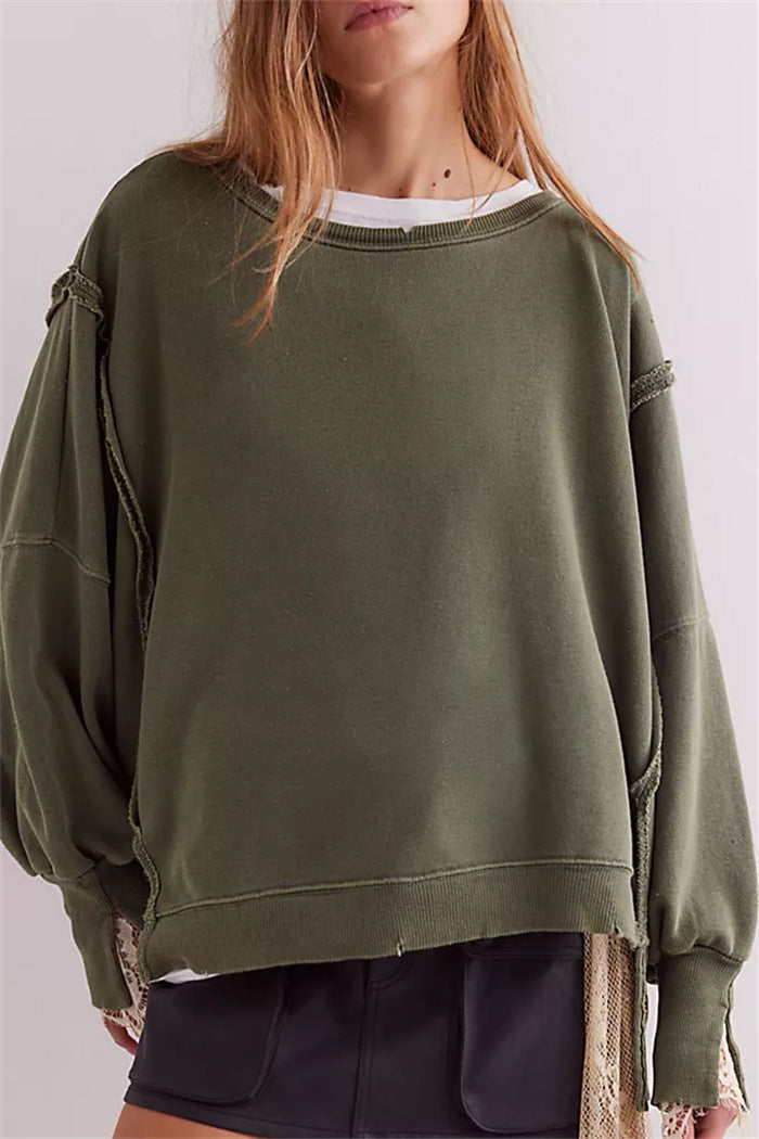 Damen oversized Sweatshirt mit Ballonärmeln, offenen Saumnähten und seitlichen Schlitzen – Avérine