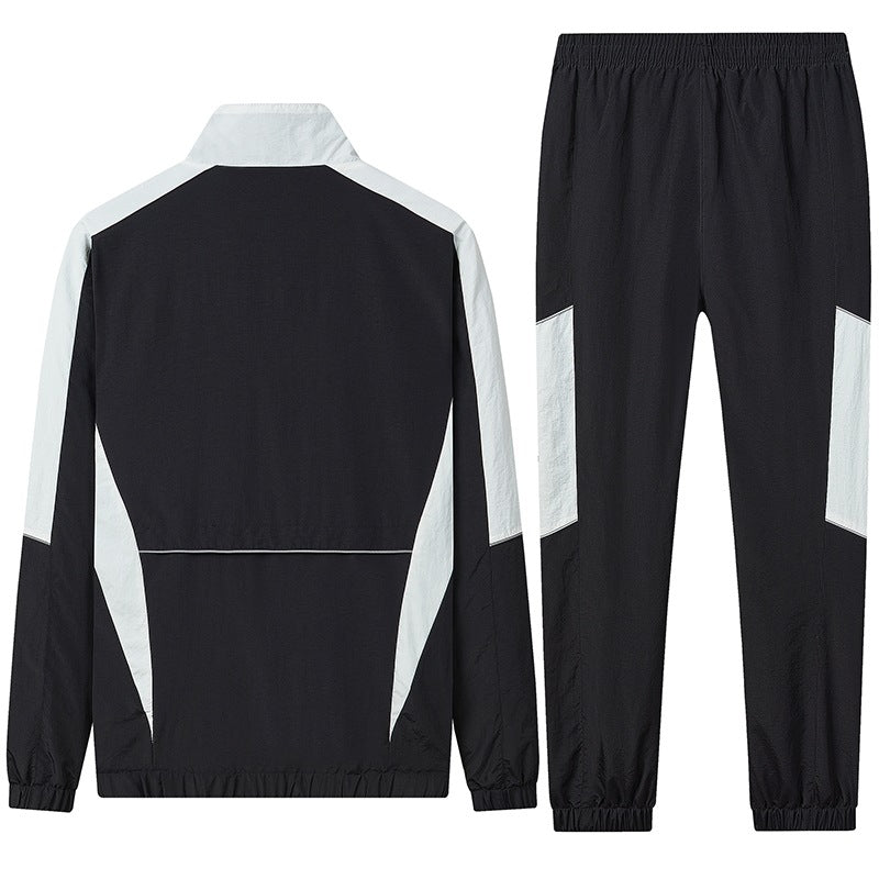 Herren Zweiteiliges atmungsaktives Nylon-Trainingsset mit Stehkragen und Kontrastpaneelen Echoarchiv