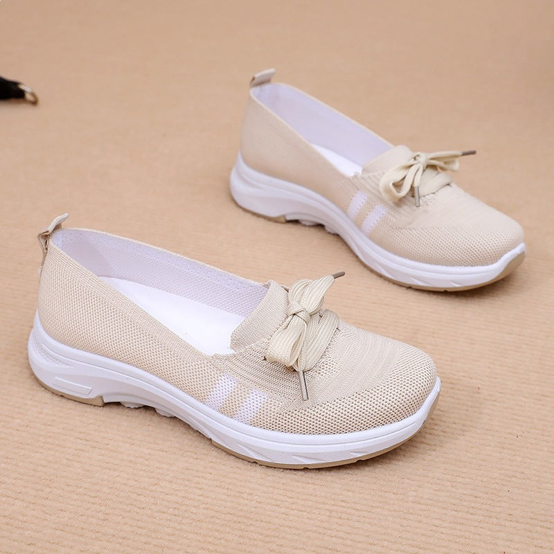 Damen Schlupf-Strick-Sneaker mit dekorativer Schleife und gedämpfter Plateausohle – Névara
