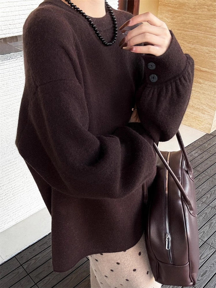 Damen Oversize-Feinstrickpullover mit Ballonärmeln und Knopfmanschette Echoarchiv