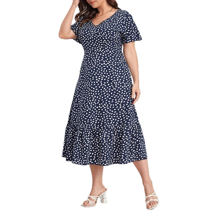 Damen Midi-Kleid mit fließendem Schnitt und verspieltem Muster Echo Archiv