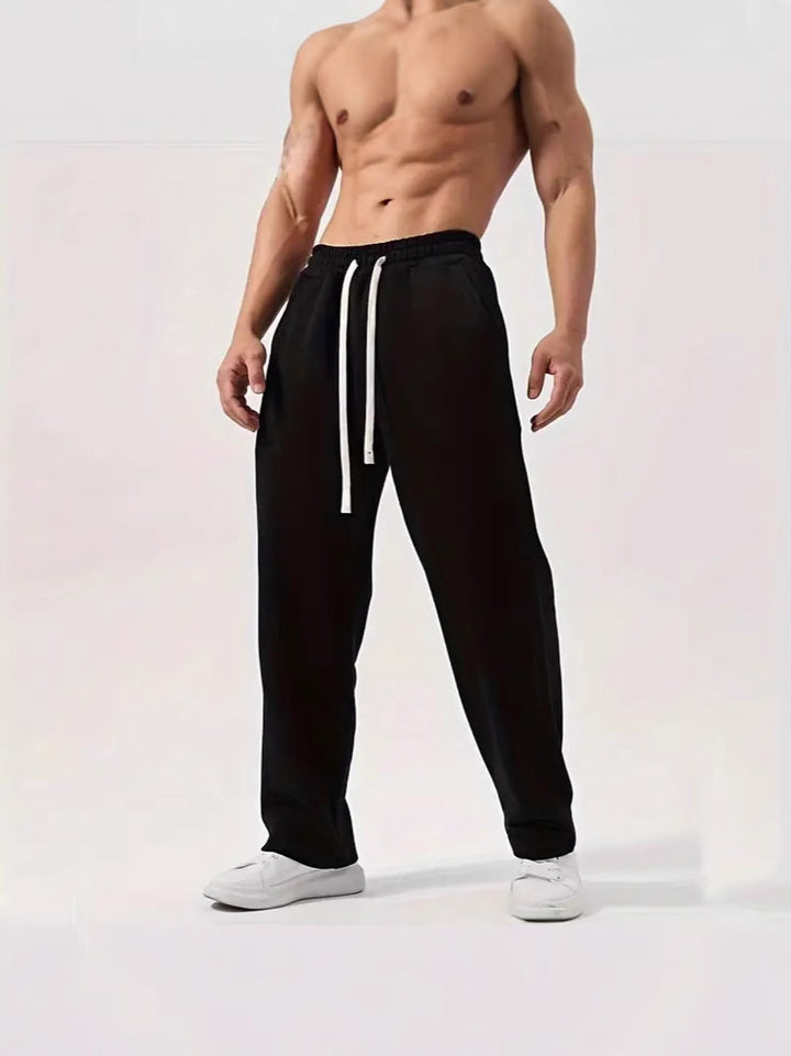 Herren nan locker sitzende Jogginghose aus Baumwollmischung mit elastischem Bund und Seitentaschen Echo Archiv