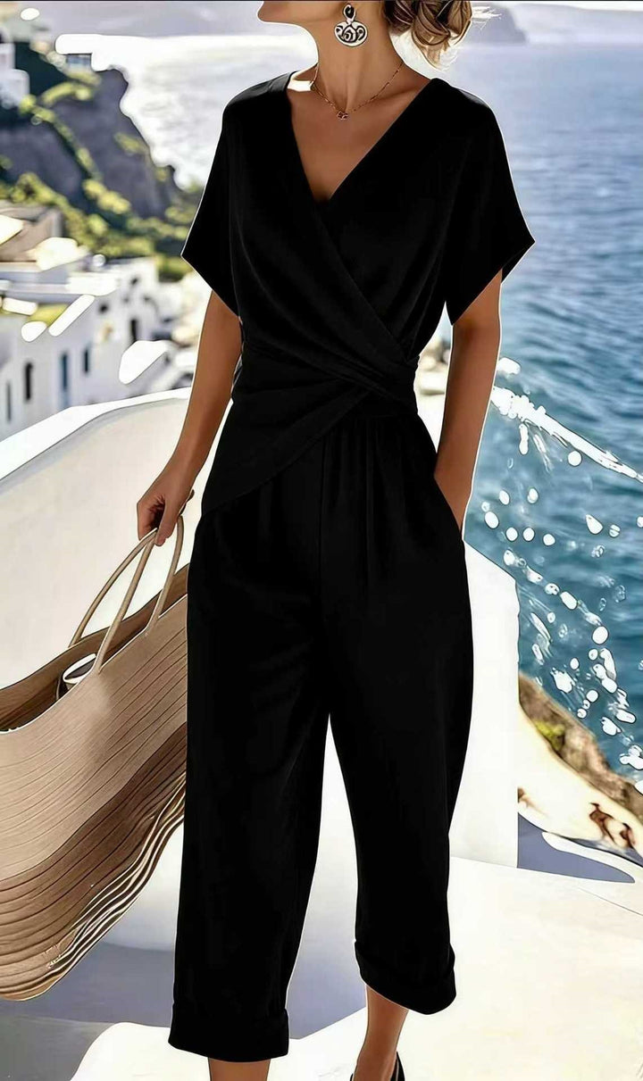Damen Eleganter Jumpsuit mit Wickeloptik und breiten Beinen Echo Archiv