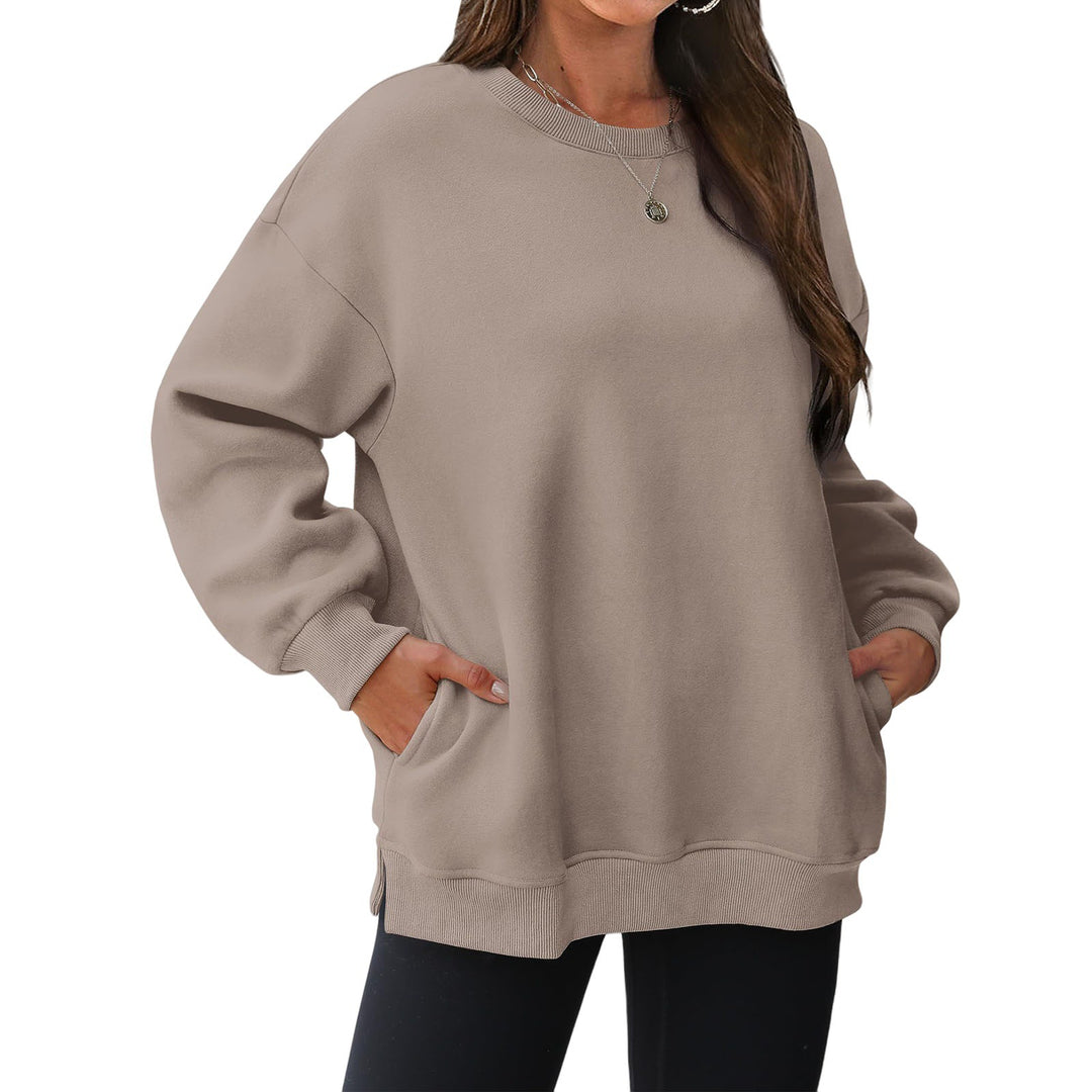 Damen verlängertes Oversize Rundhalspullover mit seitlichen Eingrifftaschen, Rippbündchen und überschnittener Schulter – Mavelle