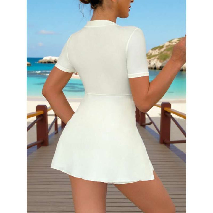 Damen elegantes Strandkleid mit dekorativem Blumenakzent Echo Archiv