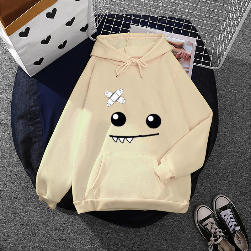 Damen Kapuzenpullover mit verspieltem Monstergesicht, Bandagen-Applikation und Kängurutasche – Auréline