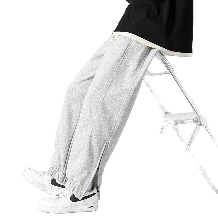 Herren weite Jogginghose mit seitlichem Reißverschluss‑Schlitz, elastischem Bund & Kordelzug Echo Archiv