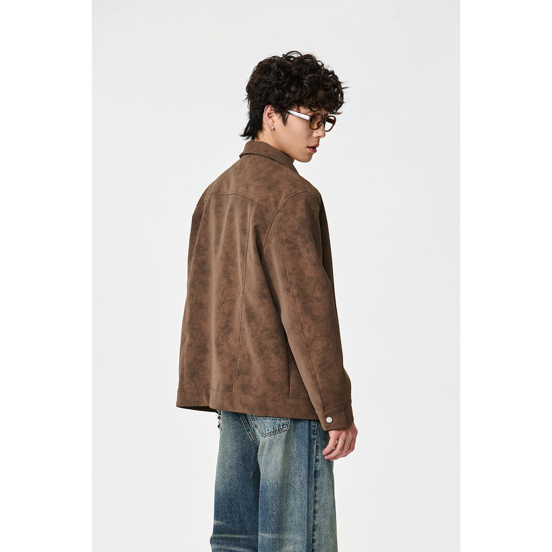 Unisex Kurz geschnittener Blouson in Wildlederoptik mit markanten Knebelverschlüssen Echoarchiv