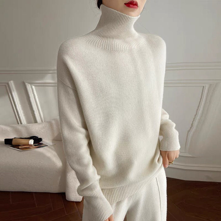 Damen Oversize Feinstrickpullover mit hohem Rollkragen und Seitenschlitzen – Mavelle