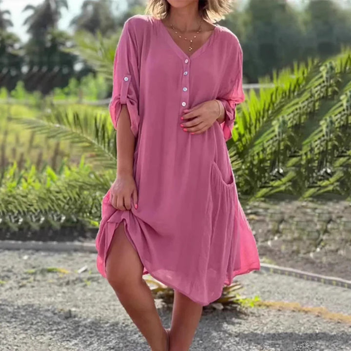 Damen nan luftiges V-Ausschnitt Strandkleid mit Knopfleiste, Krempelärmeln und aufgesetzten Seitentaschen Echo Archiv