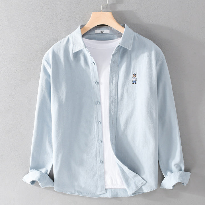 Herren Leichtes Hemd-Overshirt aus Baumwolltwill mit kleiner Figurenstickerei und kastigem Schnitt Echoarchiv