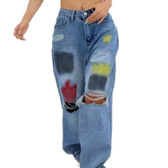 Damen weite Denim-Jeans mit Paint‑Splatter und Distressed-Knie Echo Archiv