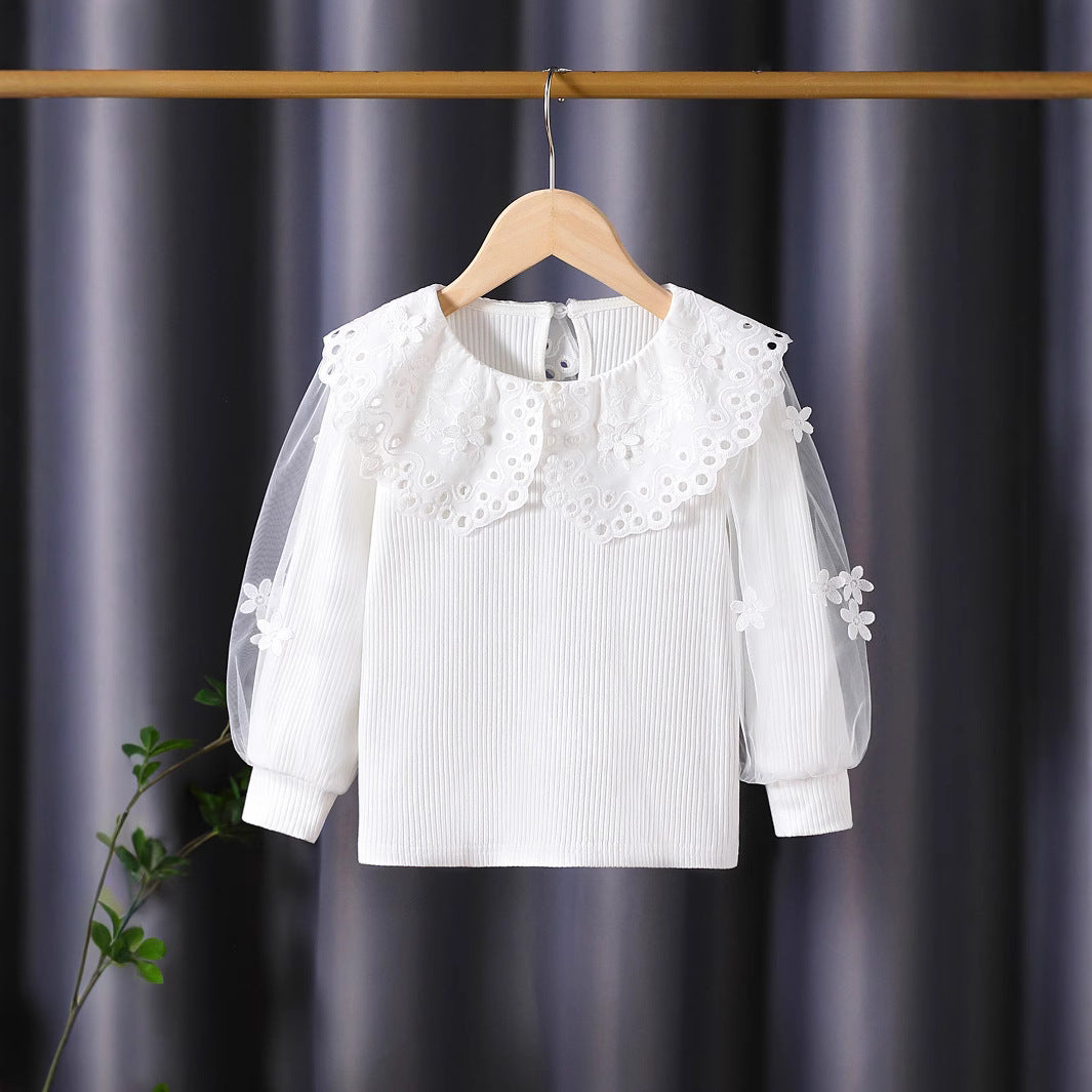 Mädchen Bluse mit voluminösen Tüllärmeln und aufwändigen Blumenstickereien Echo Archiv