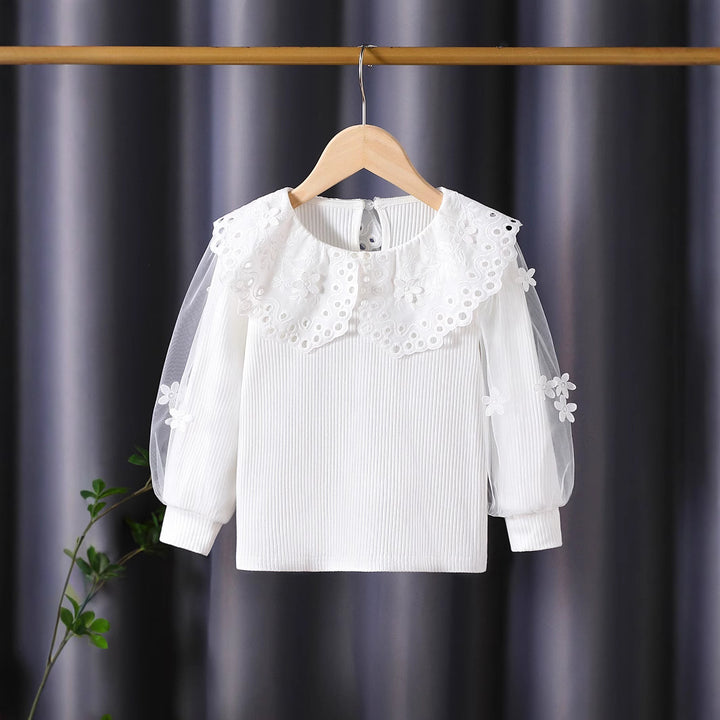 Mädchen Bluse mit voluminösen Tüllärmeln und aufwändigen Blumenstickereien Echo Archiv