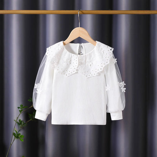 Mädchen Bluse mit voluminösen Tüllärmeln und aufwändigen Blumenstickereien Echo Archiv