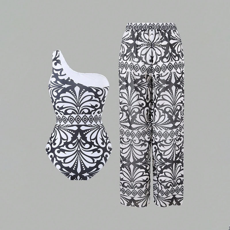 Damen Einteiler Badeanzug mit elegantem asymmetrischen Design und passender Hose Echo Archiv