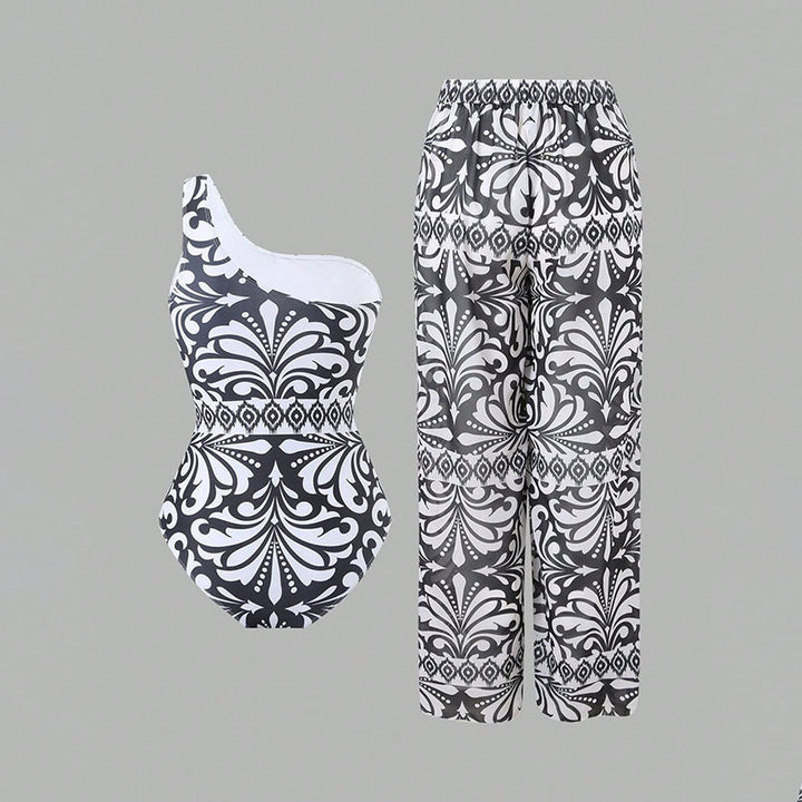 Damen Einteiler Badeanzug mit elegantem asymmetrischen Design und passender Hose Echo Archiv