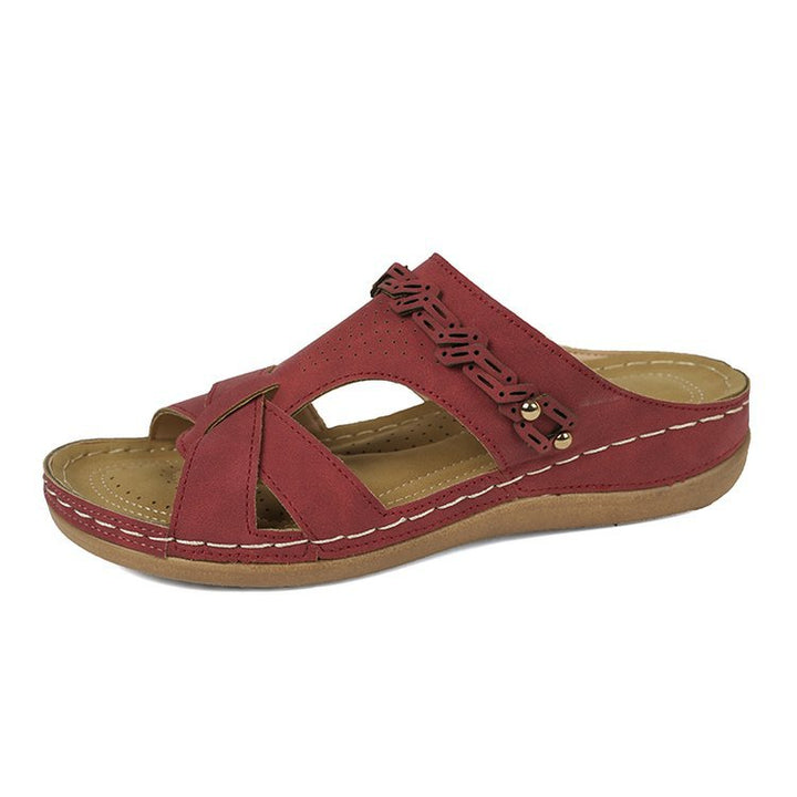Damen Lederimitat-Pantolette mit perforiertem Oberteil, gepolstertem Komfortfußbett und leichtem Keil – Sorelia