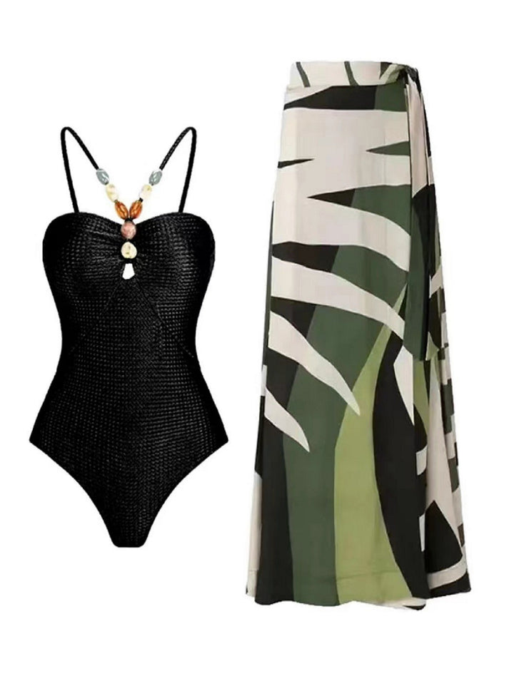 Damen Badeanzug mit trendigem Cut-Out und elegantem Wickelrock Echo Archiv